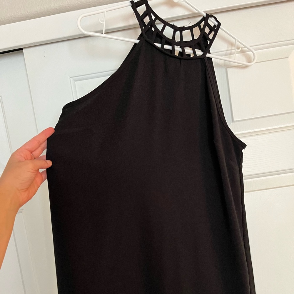 Short black dress with interesting neckline